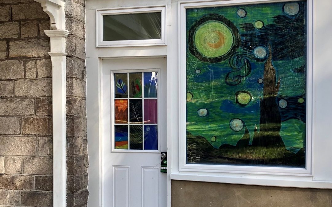 Young artists create beautiful window paintings